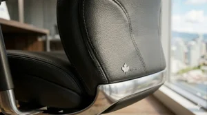 Close-up of premium leather upholstery and stitching on a high-end executive seat, showcasing luxury office chairs over 1000 CAD.