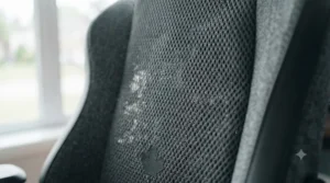 Breathable mesh fabric detail on a pc gaming chair designed for long gaming marathons.