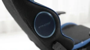 Console gaming chair with built-in surround sound speakers for an immersive gaming experience.