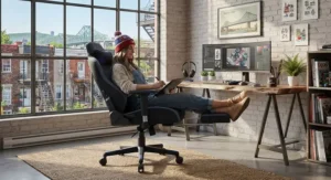 Fully adjustable gaming chair with pull-out footrest in a stylish Montreal creative workspace.