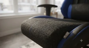 Close-up of the durable, breathable fabric upholstery on a 180 degree reclining gaming chair for console gaming, ideal for all-season comfort across Canada.
